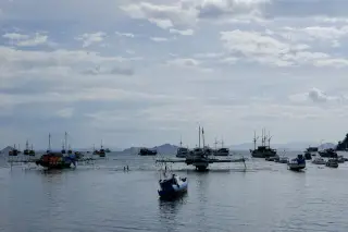 Foto arsip: A bunch of boats near Labuan Bajo Harbor, Indonesia.